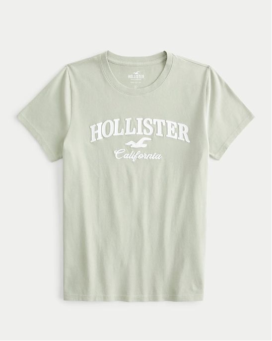Женская футболка Hollister зеленого цвета с нашитым белым логотипом. Модель 07220. Подробное описание и цена товара. Доставка по России, Москве и Области от Moscow USA