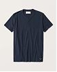 Moscow USA предлагает вам купить футболку Abercrombie Fitch темно-синего цвета с фирменной нашивкой и воротом на пуговицах. Модель 05450. Доставка по России, Москве и области, самовывоз