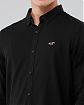Moscow USA предлагает вам купить классическую рубашку Hollister черного цвета с нашитым логотипом в виде чайки. Модель 05439. Доставка по России, Москве и области, самовывоз