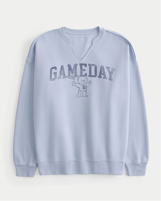 Moscow USA предлагает вам купить женский свитшот Hollister Oversized Gameday синего цвета с V-вставкой у горла и графическим рисунком. Модель 07946. Бесплатная доставка по России, Москве и области, самовывоз.
