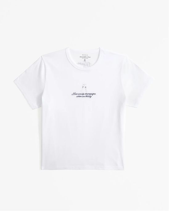 Женская облегающая футболка Abercrombie & Fitch Notorious B.I.G. белого цвета нашитой графикой. Модель 07860. Подробное описание и цена товара. Бесплатная доставка по России, Москве и Области от Moscow USA