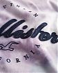 Женская футболка Hollister синего цвета с эффектом tie dye и фирменным логотипом. Модель 06688. Подробное описание и цена товара. Доставка по России, Москве и Области от Moscow USA