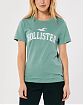 Женская футболка Hollister зеленого цвета с фирменным логотипом. Модель 06528. Подробное описание и цена товара. Доставка по России, Москве и Области от Moscow USA