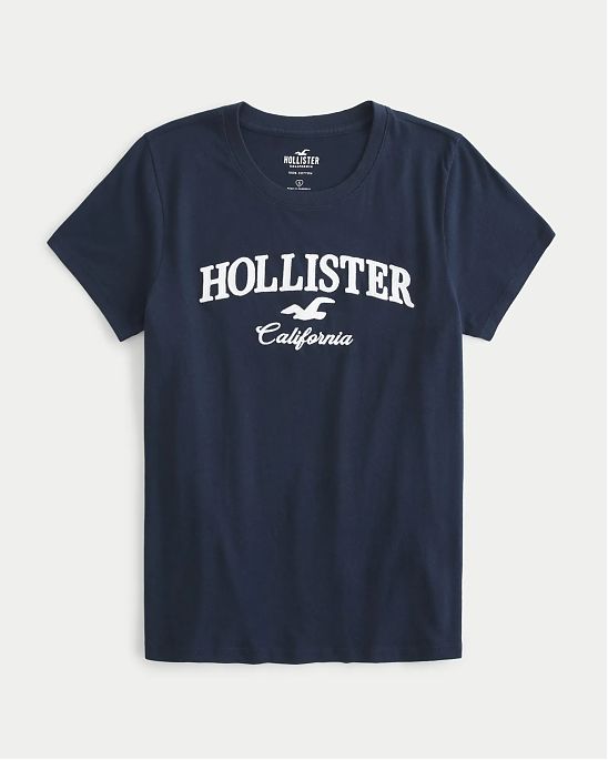 Женская футболка Hollister темно-синего цвета с нашитым логотипом. Модель 07035. Подробное описание и цена товара. Доставка по России, Москве и Области от Moscow USA