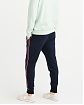 Moscow USA предлагает Вам купить классические спортивные штаны Abercrombie Fitch Joggers темно-синего цвета с красными полосками по бокам. Модель 04028. Доставка по России, Москве и области, самовывоз.