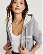 Женская толстовка на молнии с капюшоном Abercrombie Fitch светло серого цвета с шепрой и нашитой белой надписью. Модель 04761. Подробное описание и цена товара. Доставка по России, Москве и Области от Moscow USA