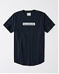 Moscow USA предлагает вам купить футболку Abercrombie Fitch темно-синего цвета с нашитой надписью. Модель 04848. Доставка по России, Москве и области, самовывоз.