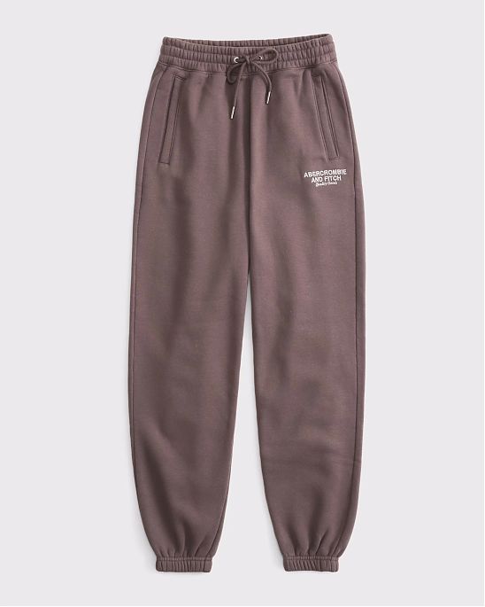 Женские спортивные штаны Abercrombie & Fitch коричневого цвета с нашитым логотипом лого. Модель 07917. Подробное описание и цена товара. Бесплатная доставка по России, Москве и Области от Moscow USA