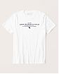 Moscow USA предлагает вам купить футболку Abercrombie Fitch белого цвета с темно-синими нашитыми надписями. Модель 05260. Доставка по России, Москве и области, самовывоз